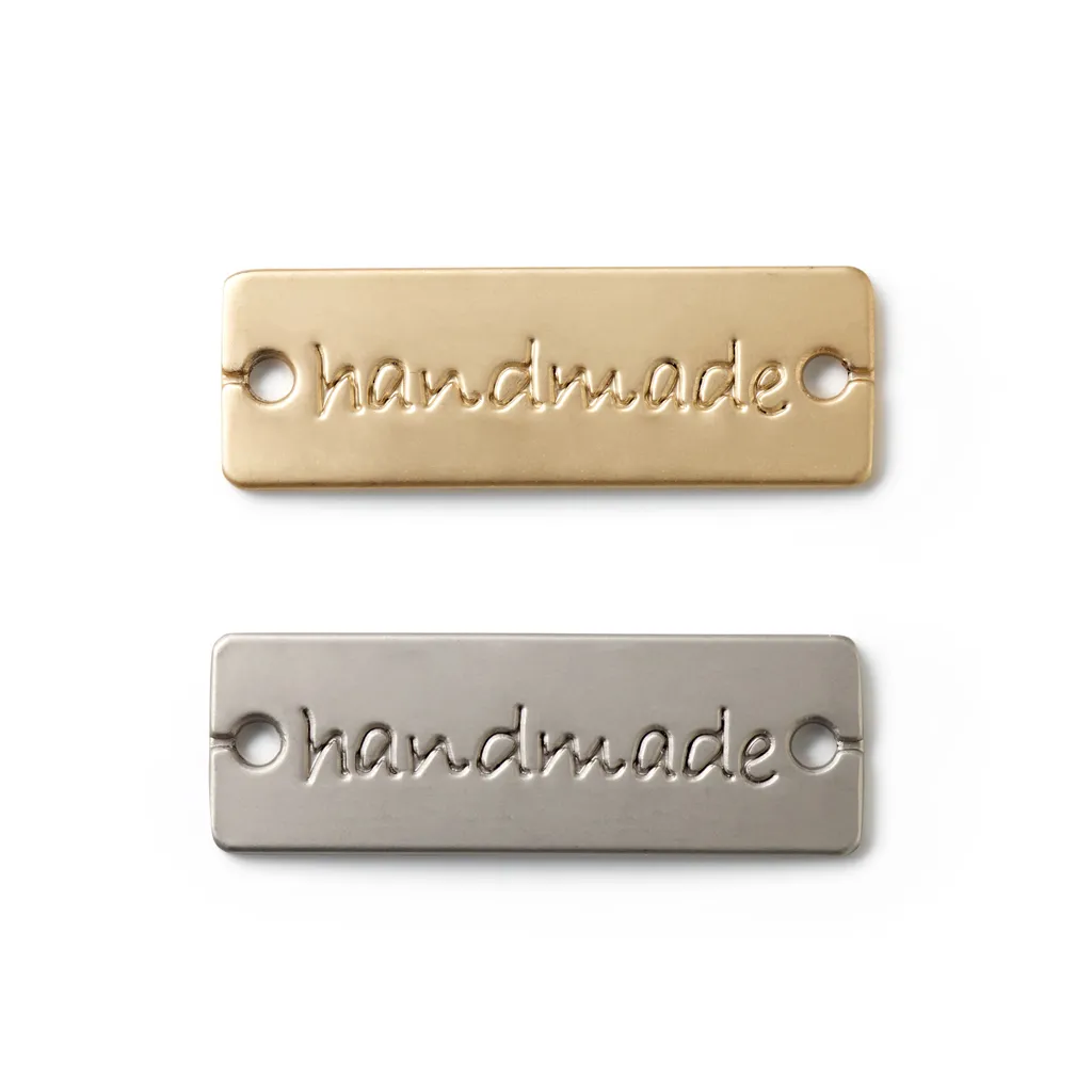 2 metalen labels 'Handmade' - 30 x 10 mm - zilver & goud - Prym